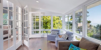 Bright solarium-style sunroom off the master suite.